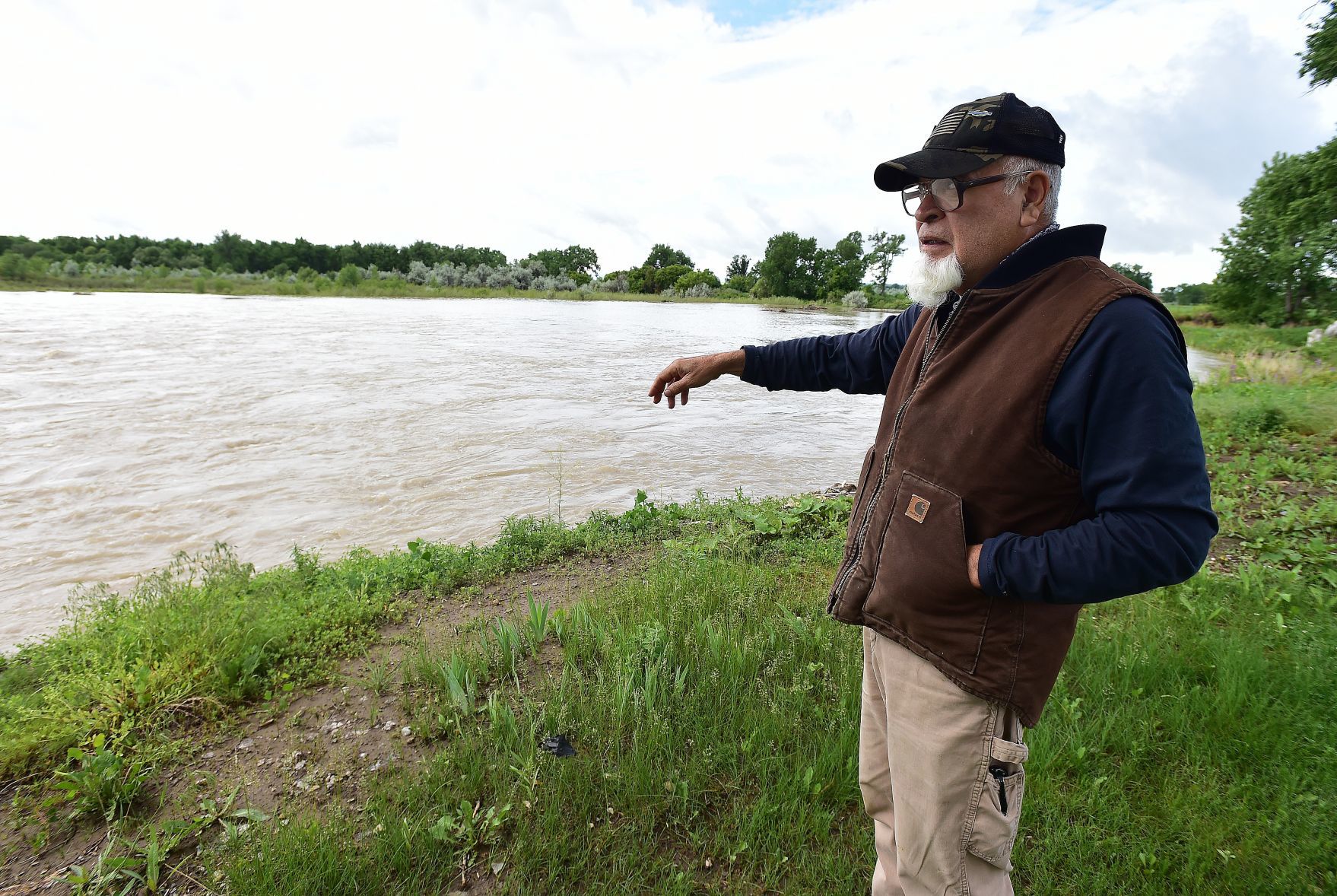 Alvarez on river bank